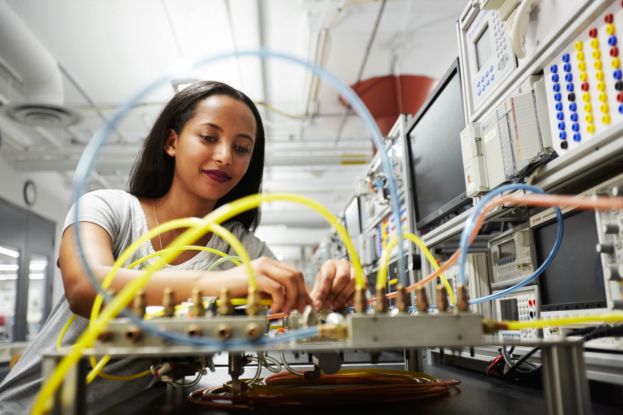 A student working on a technological prototype.