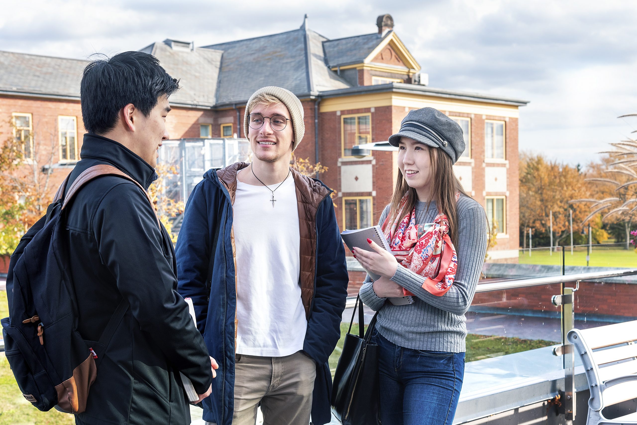 Three students chatting at Humber College's Lakeshore Campus