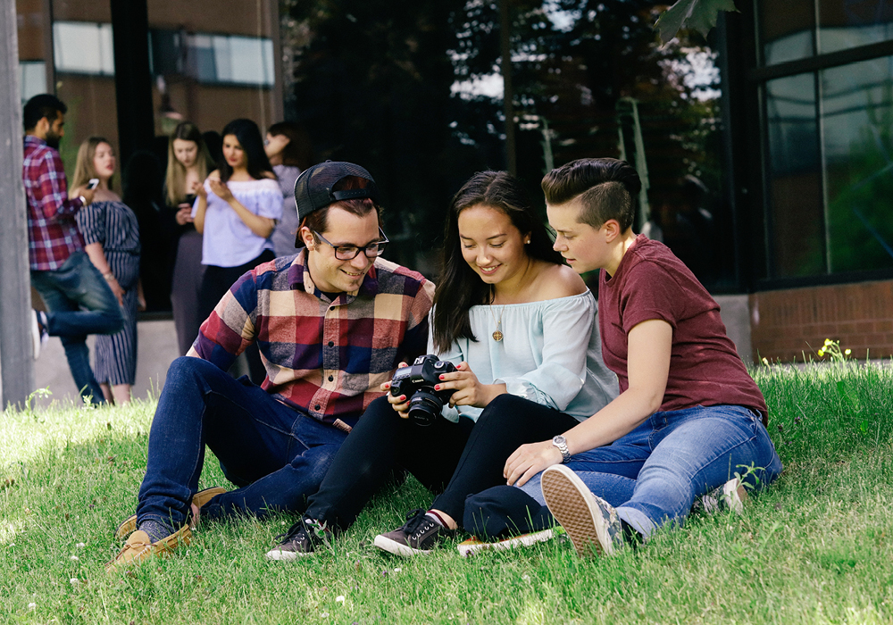 Cambrian College students outside on main campus